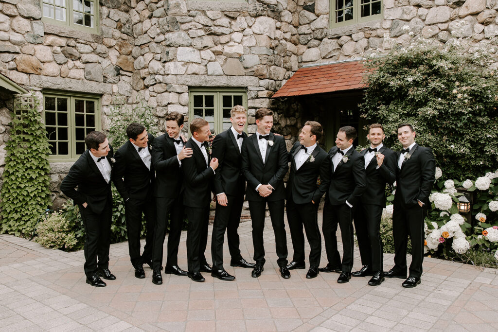 groomsmen joking around and laughing