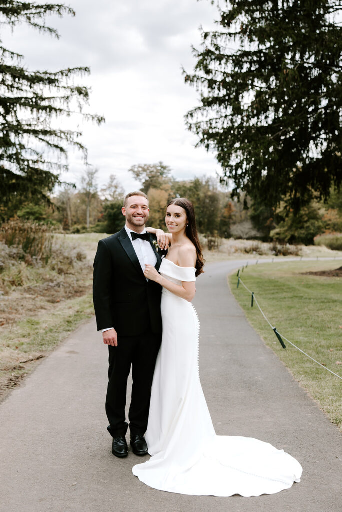 newlyweds in the middle of the golf course