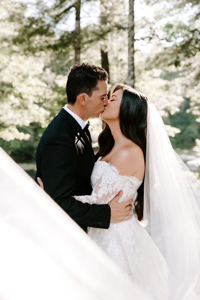 bride and groom kissing at lakeview pavilion