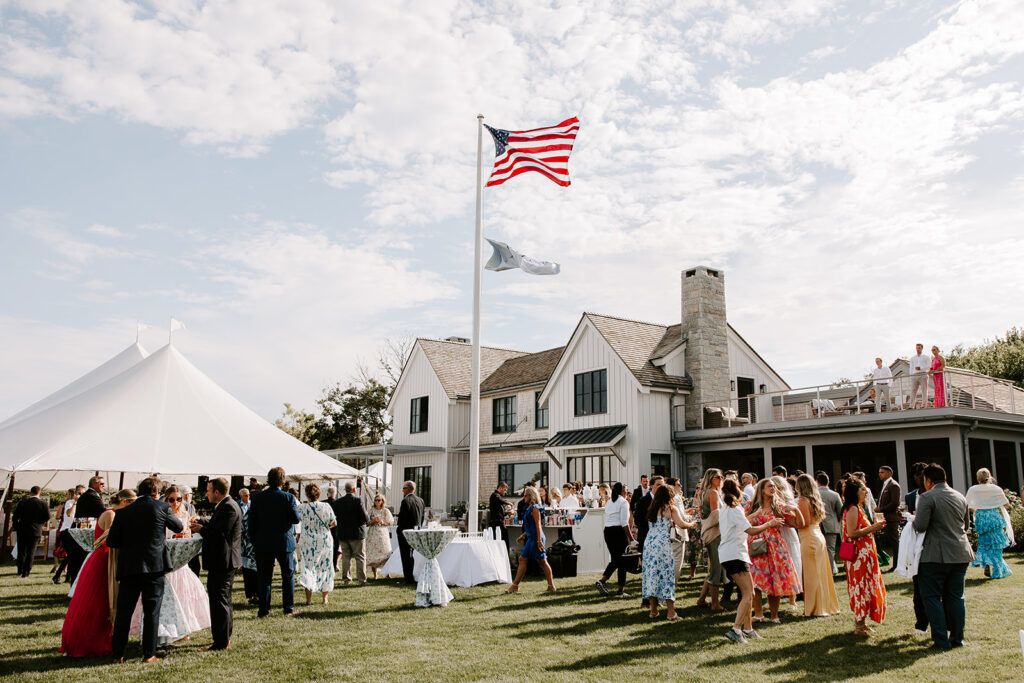 Guests enjoying a casual and delicious taco dinner under the stars at a backyard wedding