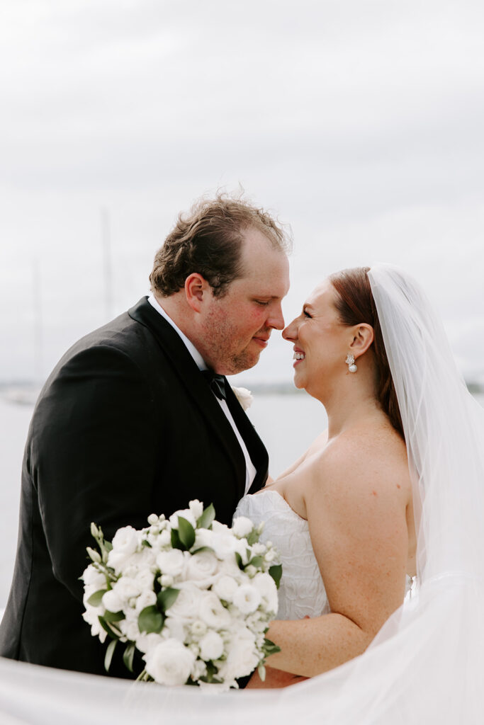 bride and groom giggling during portraits