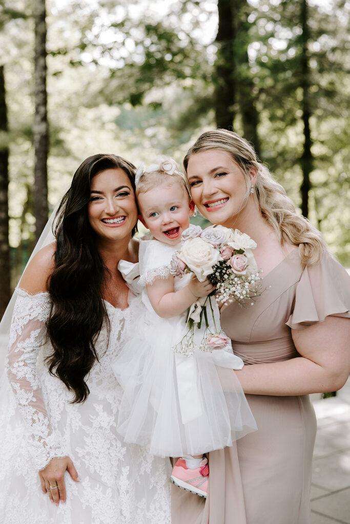 bride and baby posing