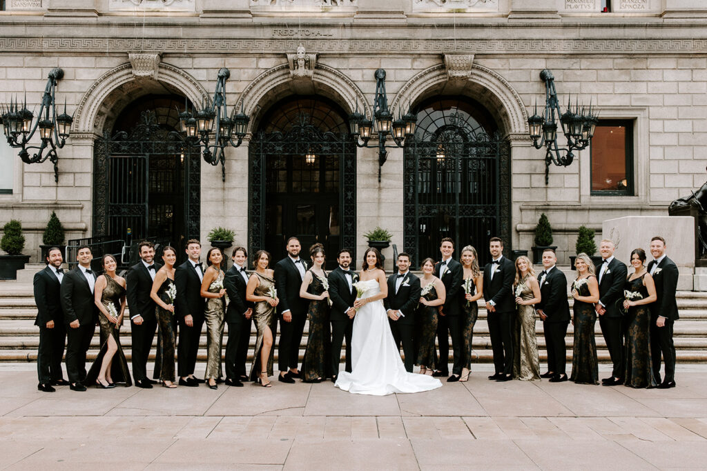 full wedding party portraits in front of boston public library