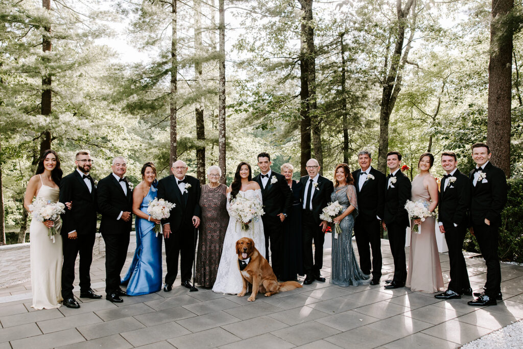 newlyweds and family and charlie their golden retriever