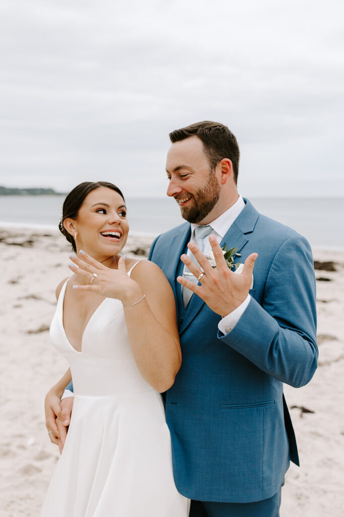 Candid moment of the couple laughing together during portraits