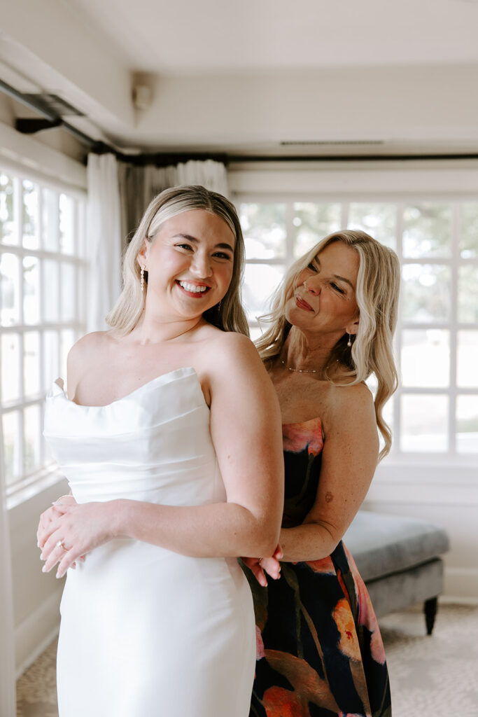 bride and mom getting ready