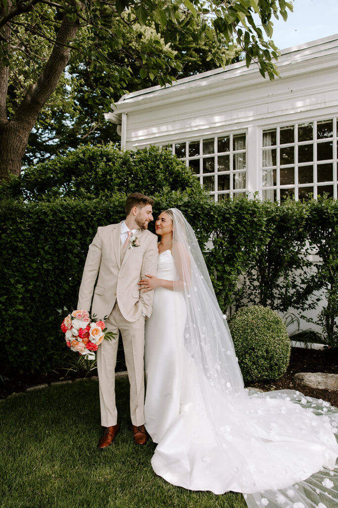 bride and groom cuddled