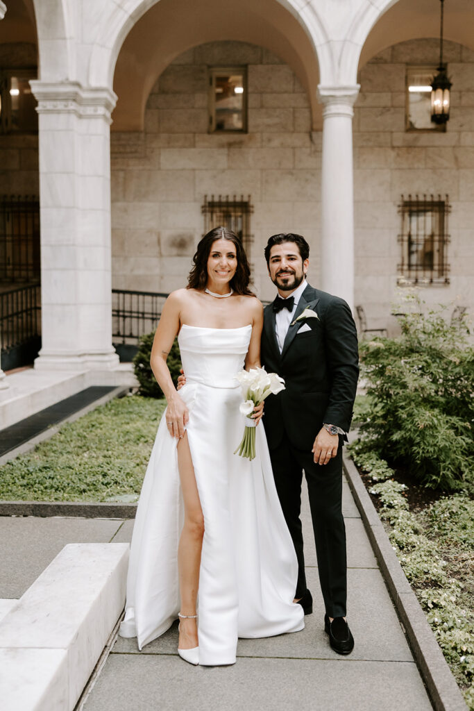 bride and groom in courtyard