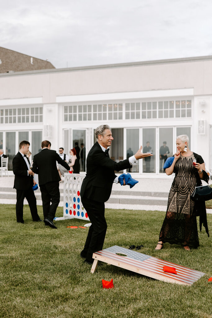 guests playing on the belle mer lawn
