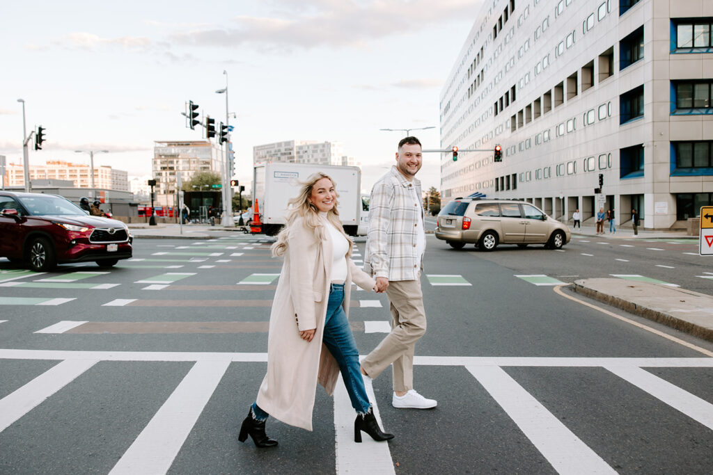 couple walking through downtown boston