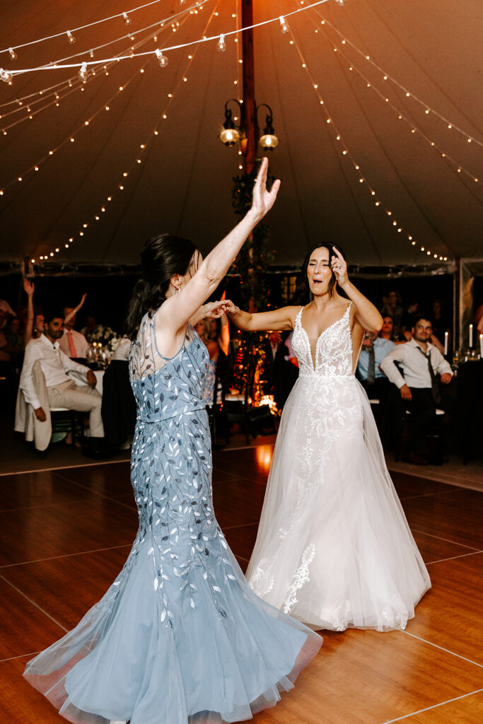 bride dancing with mother during first dance