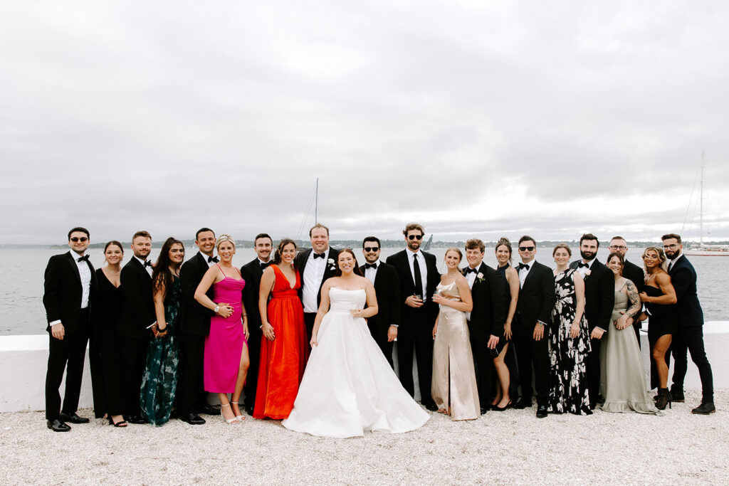 bride and groom and lots of family during cocktail
