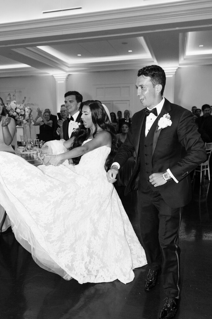 Packed dance floor with guests celebrating