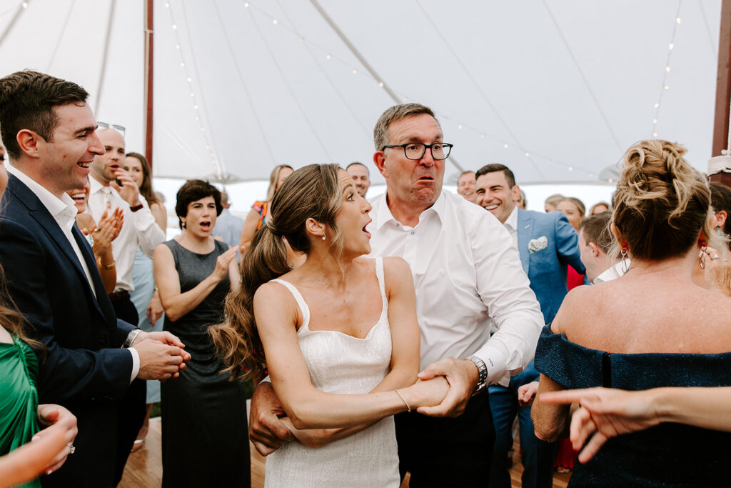 bride and father in law taking to the dance floor