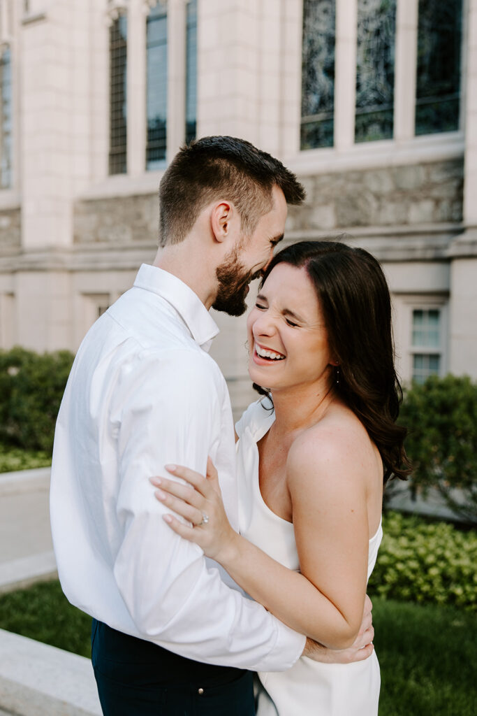 bride to be laughing during engagement session