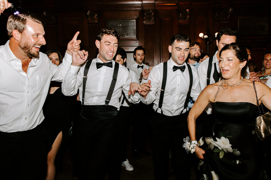 groomsmen dancing the night away boston public library
