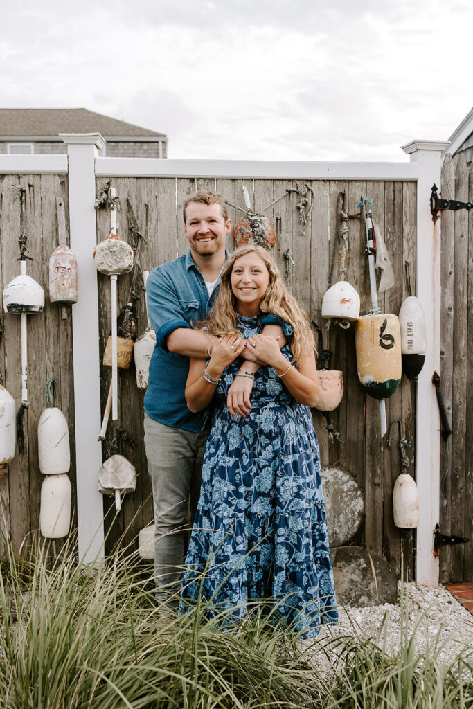 couple posing in coastal town