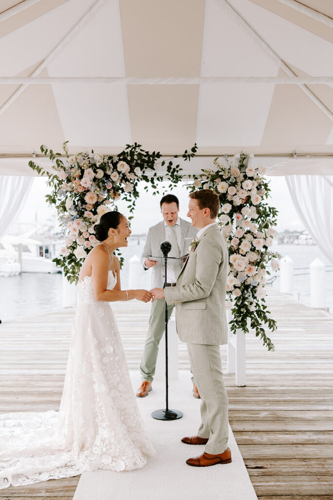 Bride and groom exchanging vows Regatta Place Newport