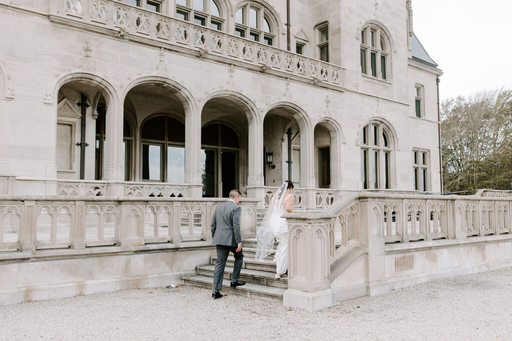 Couple portraits on the Cliff Walk terrace at Ochre Court Newport wedding photographer