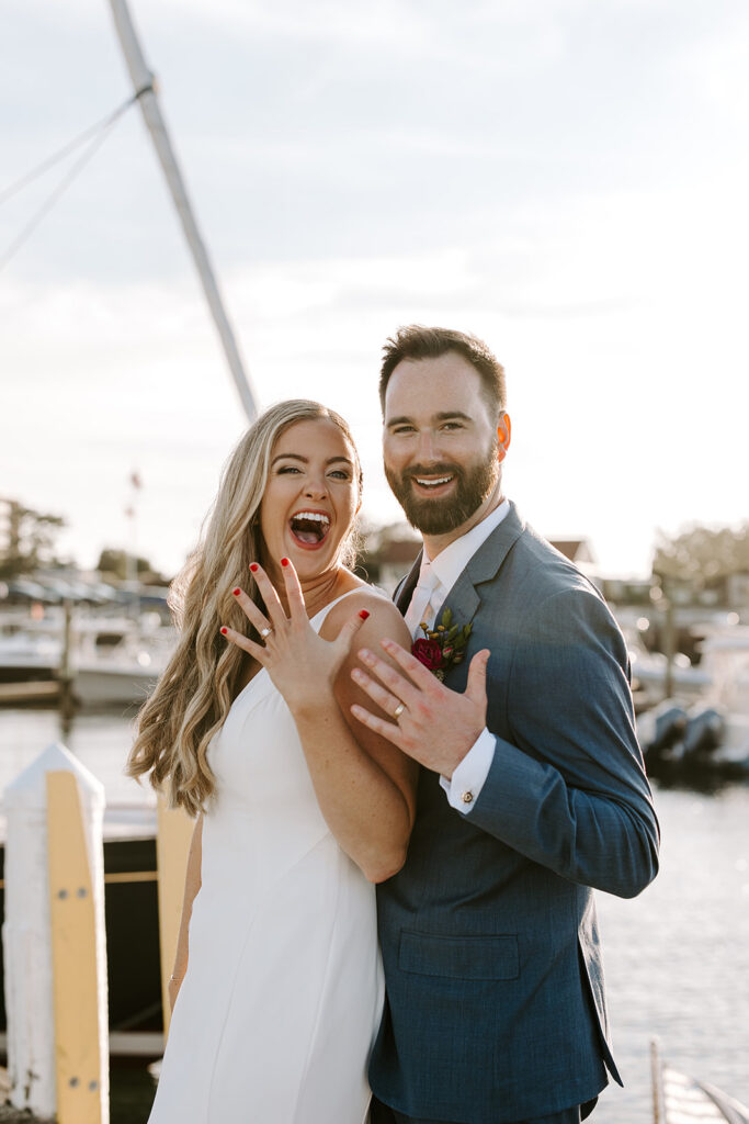 Bride and groom portraits on the dock at Regatta Place Newport RI