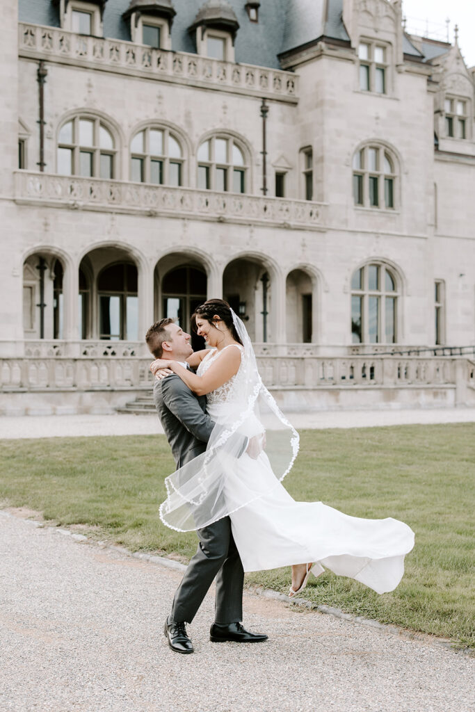 Wedding portraits inside French chateau Ochre Court Newport Rhode Island